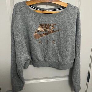 Women Nike Air Cropped Sweatshirt with gold zipper on the back in size M